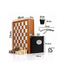 drinking flask for alcohol and wooden chess as game after shots